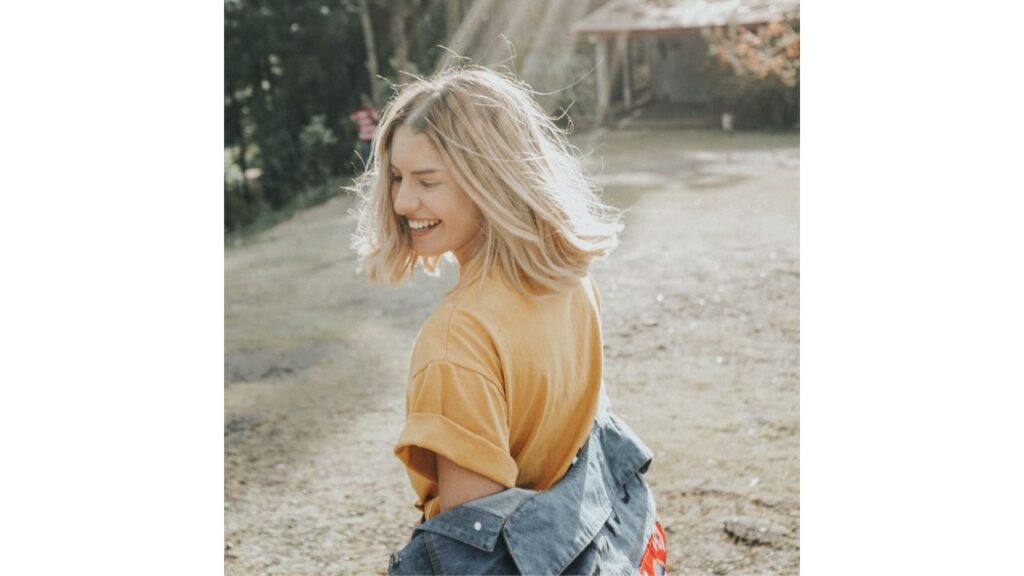 A photo of a happy person in nature. 